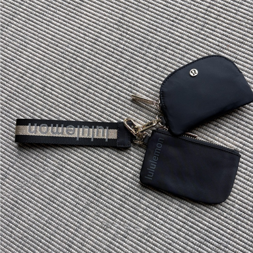 Lululemon dual pouch wristlet in black and gold